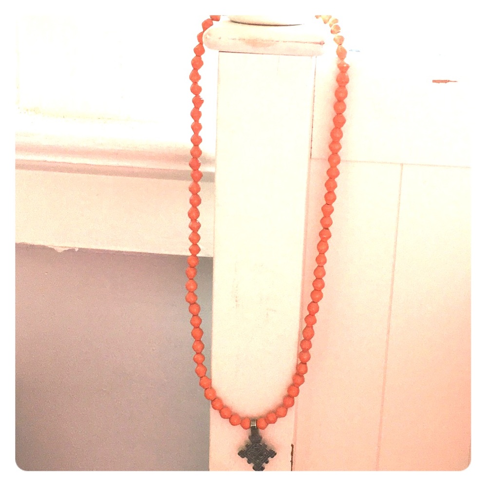 Akola Project beaded cross necklace in orange